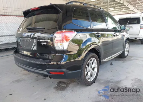 2018 Subaru Forester 2.5I Touring z USA, uszkodzony, nr VIN JF2SJAWC2JH574536